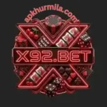 X92.bet game logo with neon red design featuring dice, chips, and 777 symbols